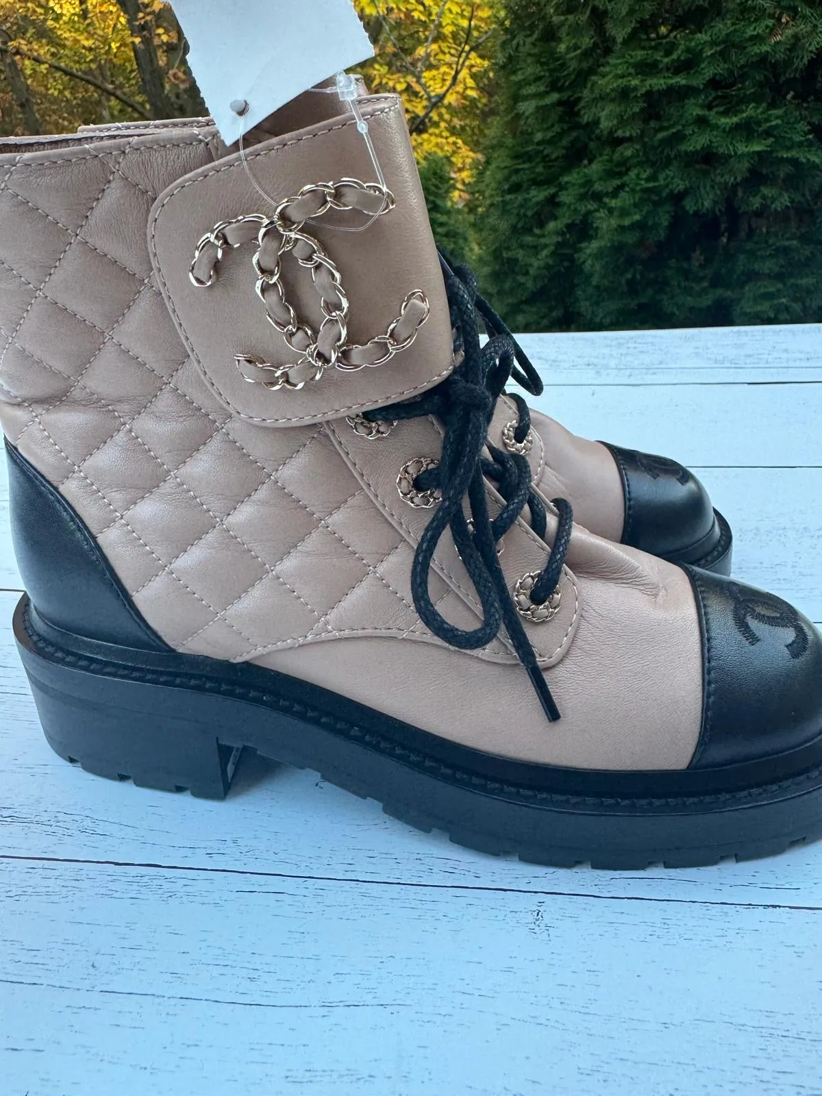 CHANEL QUILTED LAMBSKIN LACE-UP COMBAT BOOTS